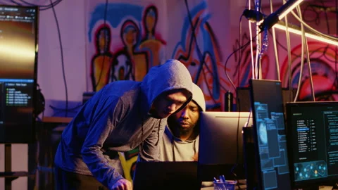 Rogue programmers hiding online activity Stock Footage 256113136
