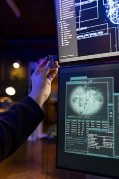 Rogue software developer penetrating firewalls using data theft script on USB Stock Photos