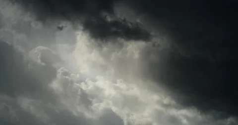 Roiling black, white, gray chaotic clouds time lapsed move R-L ominous doom Stock Footage 152525195