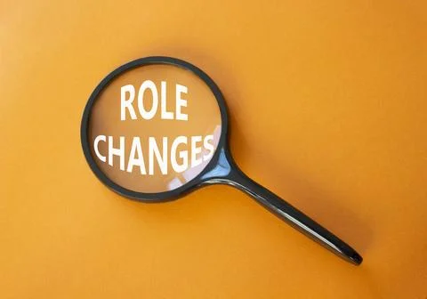 Role changes symbol. Concept words Role changes on magnifying glass. Beauti.. Stock Photos