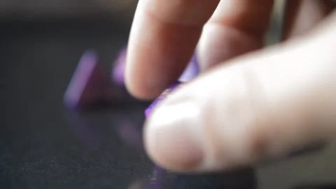 Role playing game player take a dungeons and dragons dice. Stock-Footage 229640106