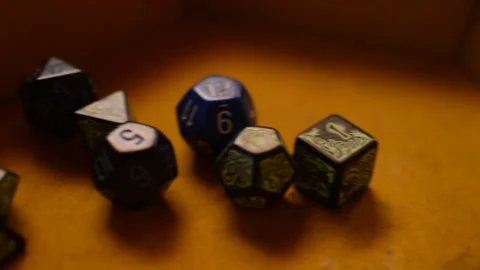 Role playing game's dice for dungeons and dragons game on the game board. Stock-Footage 225859495