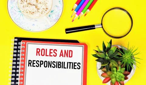 Roles and responsibilities. Text label in the planning notebook. Stock Photos