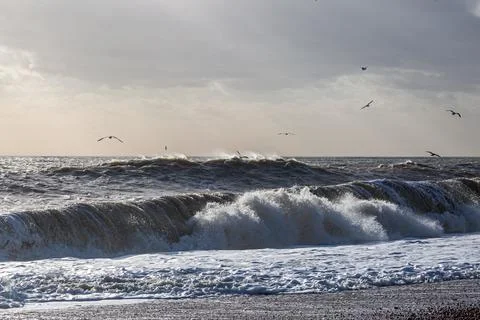 Roling Waves at Brighton Beach, on a Windy February Day Stock Photos