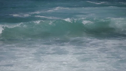 Roling waves fall against the rocks at Bondi Beach, in slow motion Stock Footage 86848374