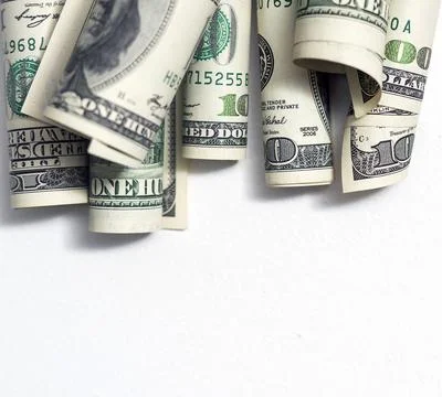 Roll of 100 dollar bills on background Stock Photos