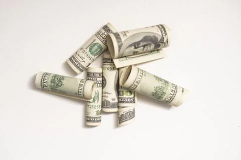 Roll of 100 dollar bills on background Stock Photos