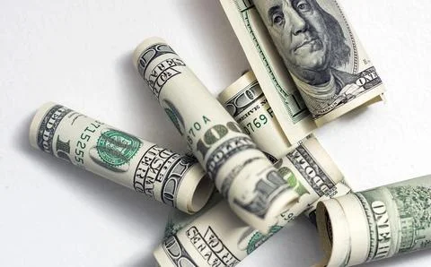 Roll of 100 dollar bills on background Stock Photos