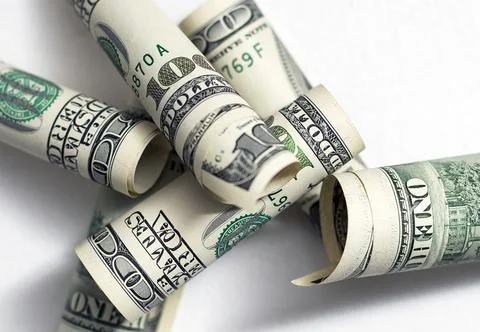 Roll of 100 dollar bills on background Stock Photos