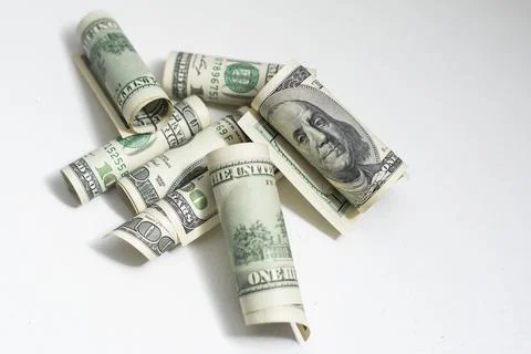 Roll of 100 dollar bills on background Stock Photos