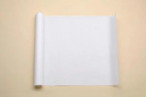 Roll of baking paper on beige background, top view Stock Photos