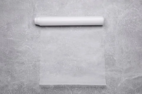 Roll of baking paper on light grey table, top view Stock Photos