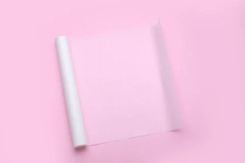 Roll of baking paper on pink background, top view Stock Photos