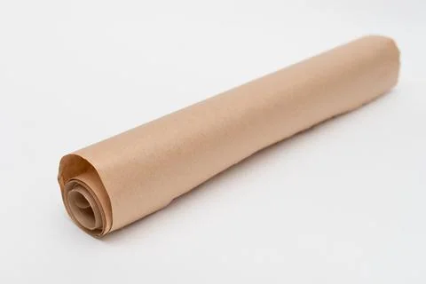Roll of baking paper on white background Stock-Fotos