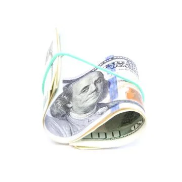 Roll of banknotes on a white background. Stock Photos