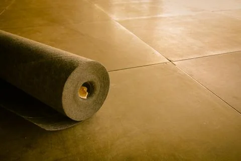 The Roll of Black Carpet at the Constructionsite Stock Photos