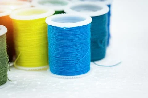 The roll of blue thread put on background,for needlework,craft,sewing and tai Stock-Fotos