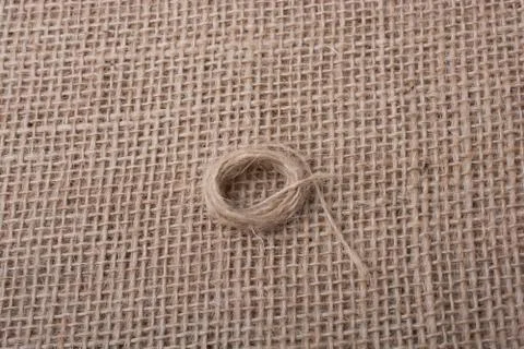Roll of brown color linen string Stock Photos