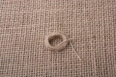 Roll of brown color linen string paper background Stock Photos