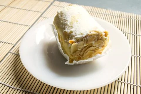 Roll cake with almond Foto stock