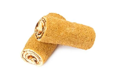 Roll cake isolated on a white background Stock Photos
