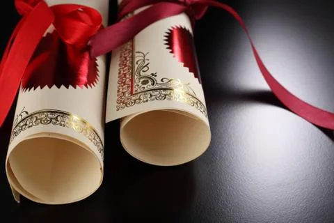 Roll of certificate on the black background Foto stock
