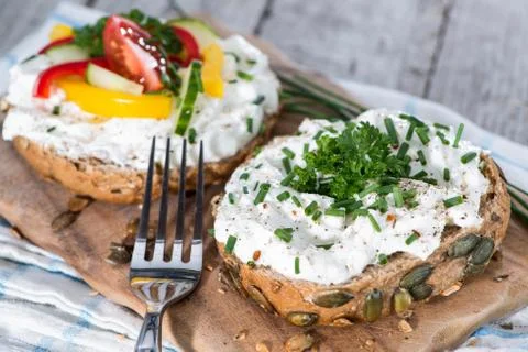 Roll with curd and herbs Stock Photos