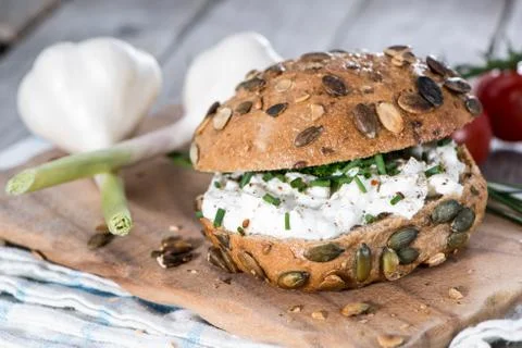 Roll with curd and herbs Stock Photos