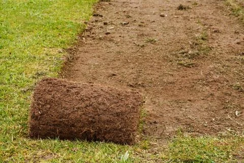 Roll of cut turf Stock Photos