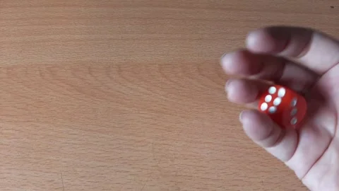 A roll of a die results in a 4 four Vidéo 284441981