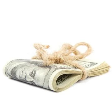 Roll of dollar banknotes on white background. Stock Photos