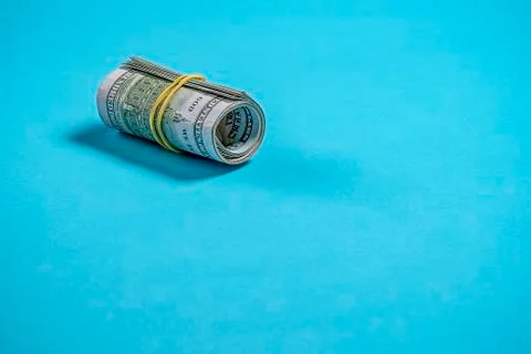 Roll of dollars for a pretty background Stock Photos