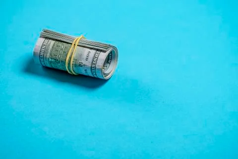 Roll of dollars for a pretty background Stock Photos