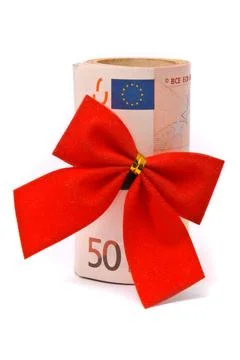 Roll of Euro money and red bow isolated on white background Roll of Euro m... Stock Photos