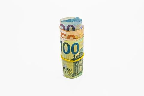 Roll of Euro notes in the elastic band. EU banknotes in a money roll Stock Photos