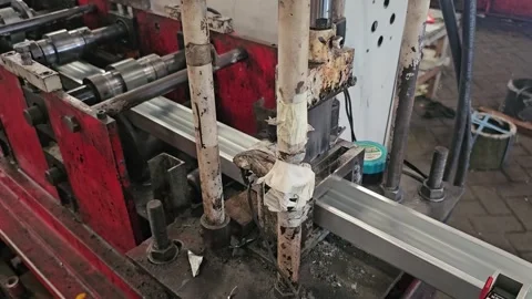 Roll Forming Machine Cutting Lightweight Steel C Channel Frame Stock Footage 314697952