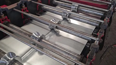 Roll Forming Machine Producing Lightweight Steel Spandek Roof Stock Footage 314691850