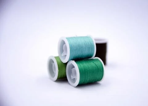 Roll of green threads put on white background,show texture,for needle work Stock Photos