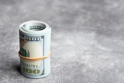 Roll of hundred dollars. Stock Photos