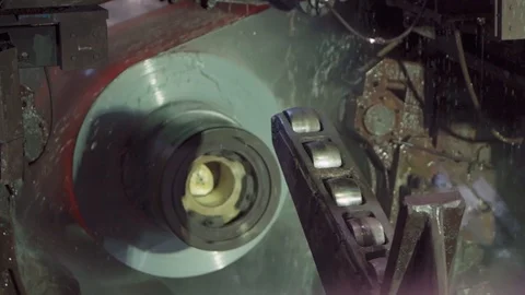 Roll of metal sheets on industrial machine. Automation of work. Stockbeeldmateriaal 130028178
