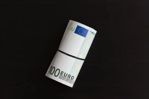 Roll of one hundred euro bills 写真素材