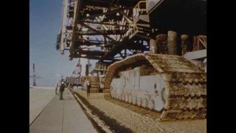 Roll out of the Apollo 8 spacecraft at a Saturn V rocket Stock Footage 297183162