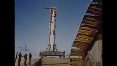 Roll out of the Apollo 8 spacecraft at a Saturn V rocket Stock Footage 297183186