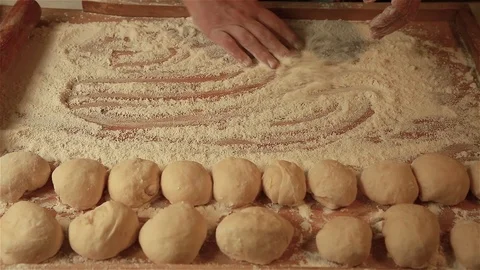 Roll out the blanks with a rolling pin Stock Footage 91287976