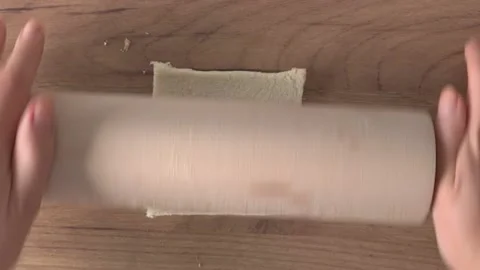 Roll Out The Bread For Making Hot Dog Stock Footage 220349813