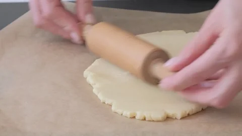 Roll out cookie dough. Sand dough preparation Stock Footage 243682278