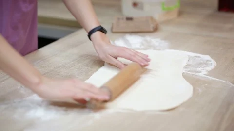 Roll out the dough for pizza Stock Footage 121327689