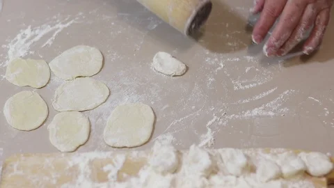 Roll out the dough with a rolling pin Stock Footage 126362126