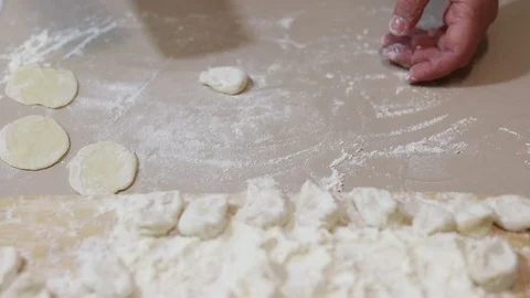 Roll out the dough with a rolling pin Stock Footage 126362128