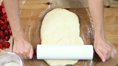 Roll out dough, slow motion Stock Footage 6900287